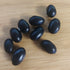Black beans on a wooden surface